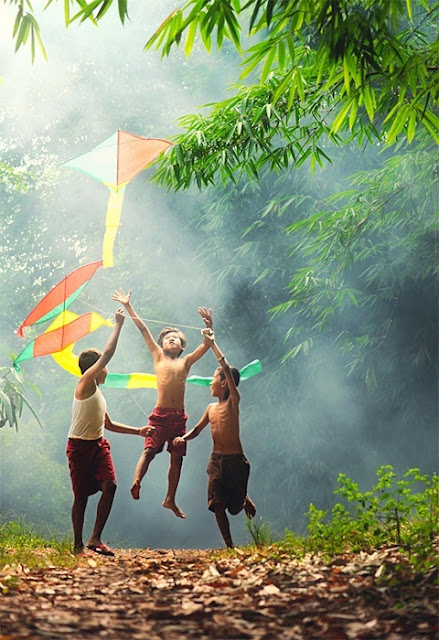 children flying a kite