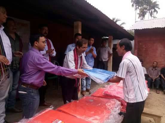 DC Hazarika distributes Relief Materials 