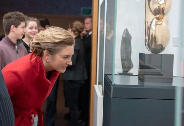 Duke Guillaume and Hereditary Grand Duchess Stéphanie at Night of Museums event. Stephanie wore red wool coat