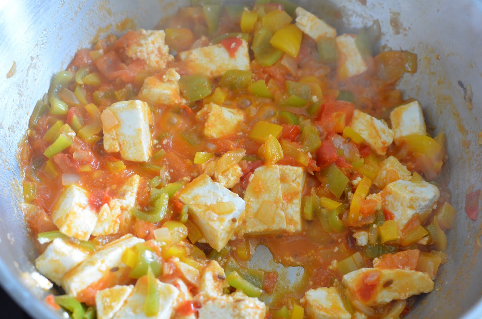 Shakshouka ( Poached eggs in tomato gravy)