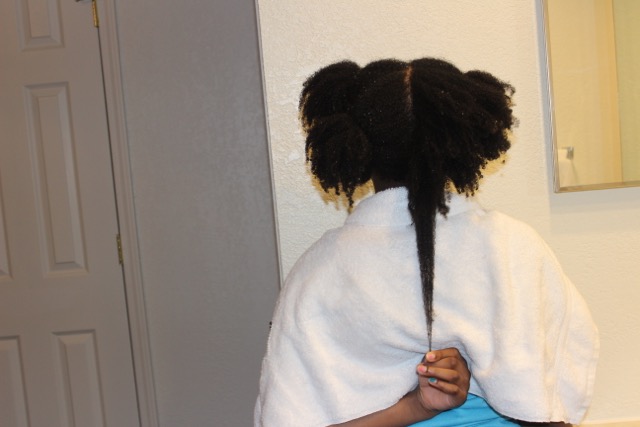 Back view of long midback hair with large waves