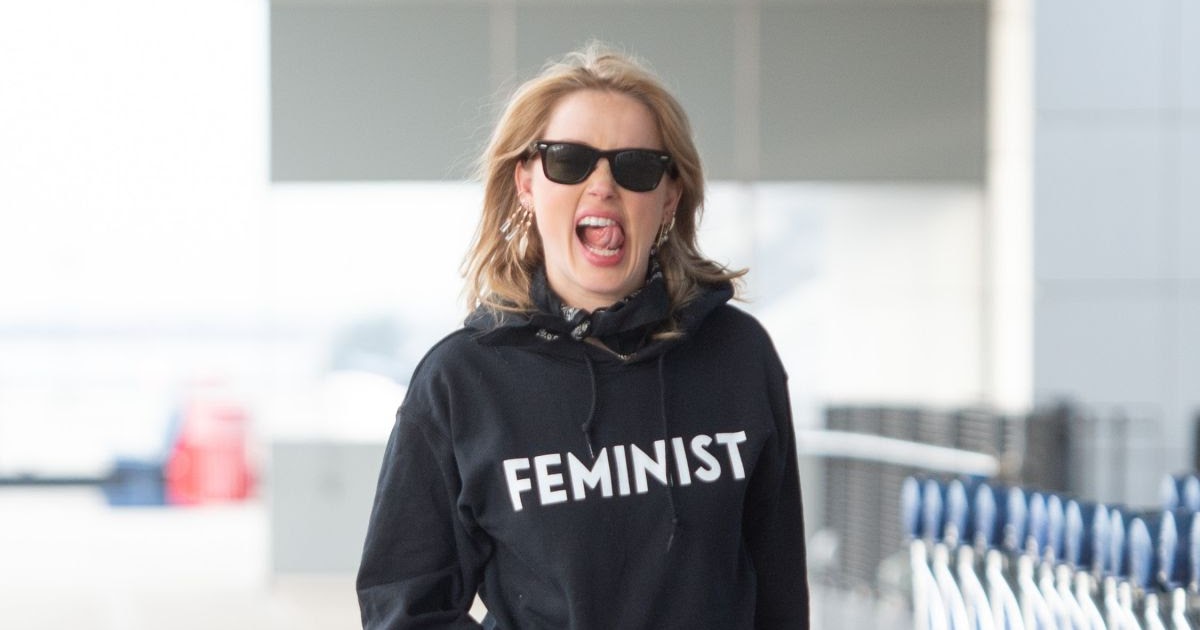 Amber Heard wears Feminist hoodie at JKF Airport
