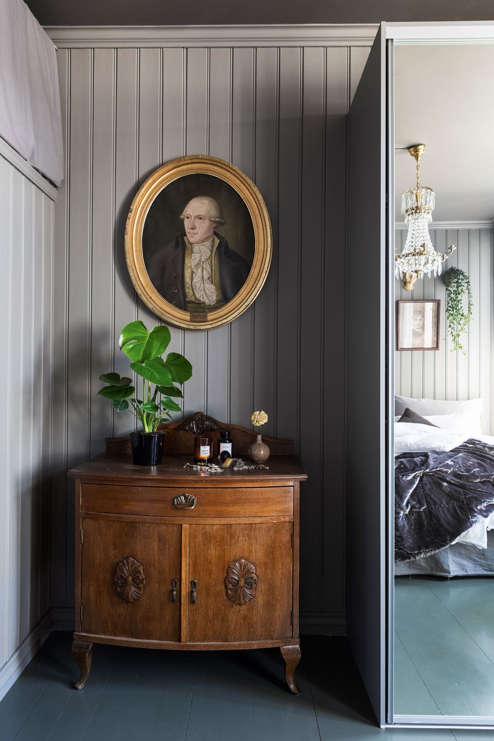 charming rustic scandinavian apartment, wood paneling, white floor, art, bedroom
