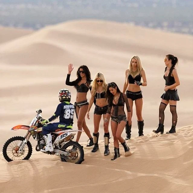 Paddock girls with Motocross Sand Bike