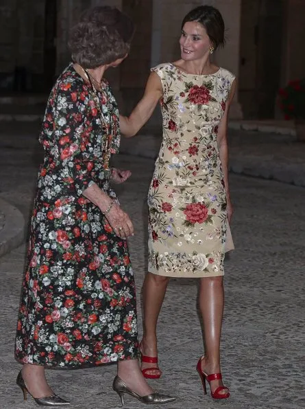 King Felipe and Queen Sofia at Almudaina Palace. Queen Letizia wore a malina print dress and Magrit shoes