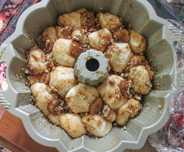 Food Lust People Love: Bananas Foster Monkey Bread takes everyone's favorite pull apart loaf (usually made with bread dough balls rolled in sugar) to a whole new holiday level with bananas and rum. Put one of these guys on your party table and watch it disappear.