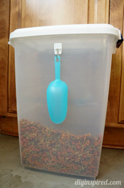 Clever dog container idea - scoop with hook :: OrganizingMadeFun.com