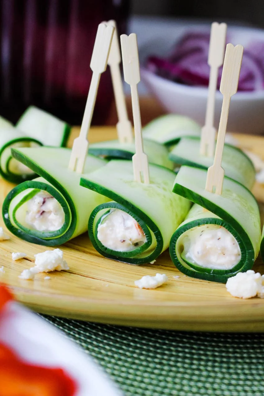 Cucumber Feta Rolls are the perfect party appetizer featuring fresh cucumbers rolled around a flavorful feta cheese filling.  #appetizer #cucumbers #feta