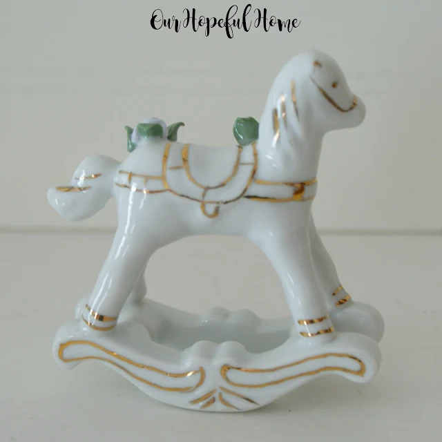 Vintage Enesco porcelain rocking horse with gilding and flowers