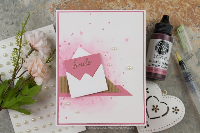 With the pretty watercolor background, created with Liquid Color, This pretty card is perfect for any occasion. 