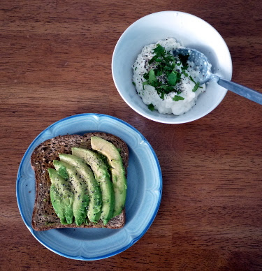 avocado toast and cottage cheese with chopped cilantro