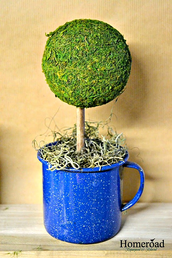 topiary in blue enamel mug