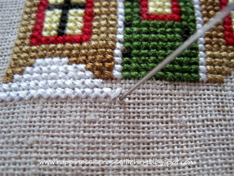 Cross stitching two over two on linen
