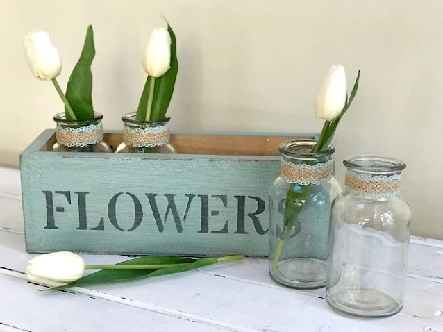 Creating a Rustic Flower Box with glass bottle flower vases