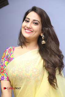 Telugu Actress Anchor Manjusha Stills in Yellow Saree at Janaki Ramudu Audio Launch  0011