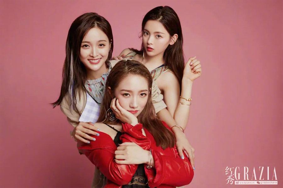 From left to right) Contestants Wu Xuanyi, Meng Meiqi and Yang Chaoyue pose...