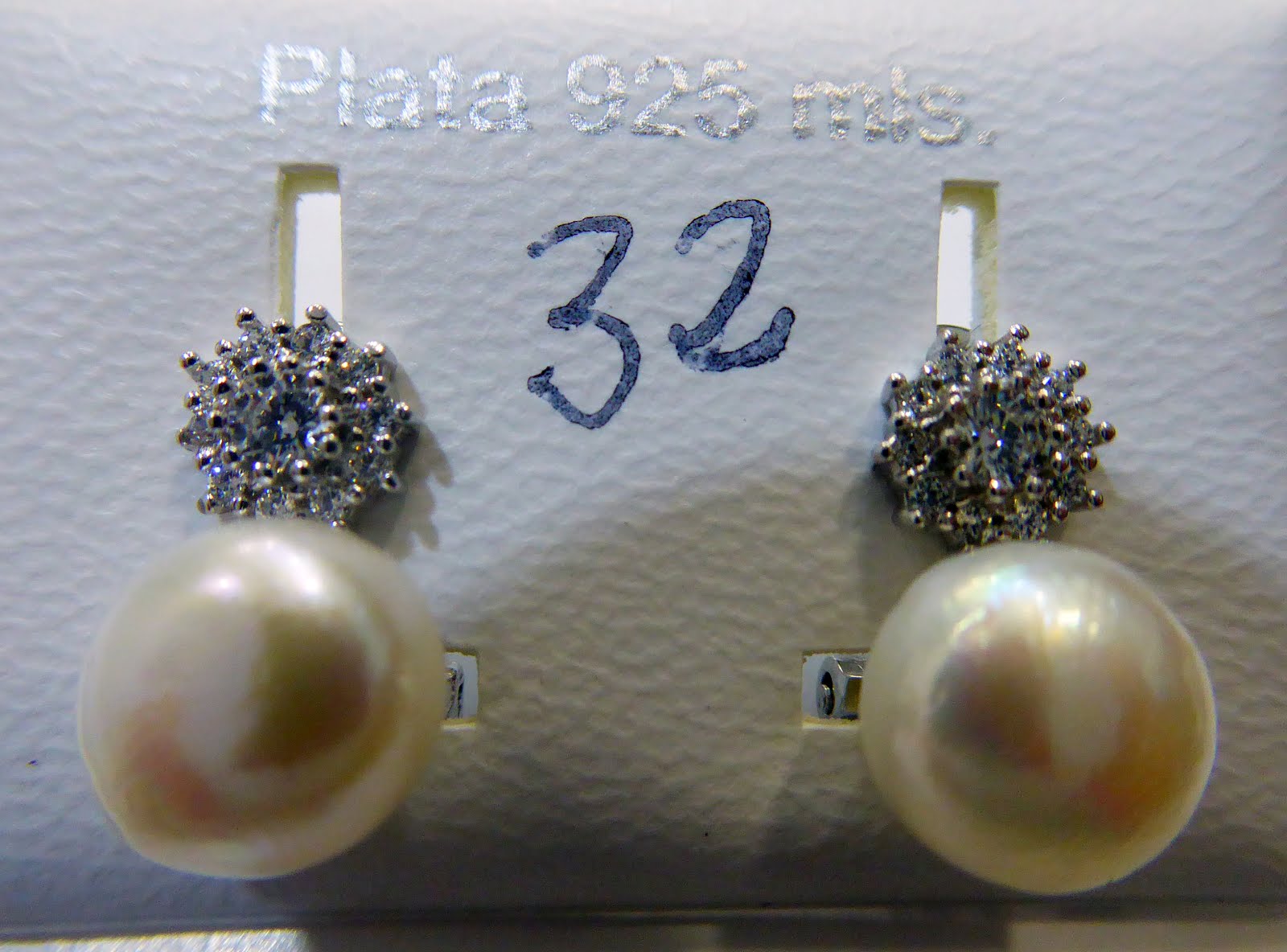 Pendientes de perla de plata con cierre omega