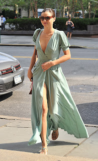  Miranda Kerr showing off her legs in a ming green dress