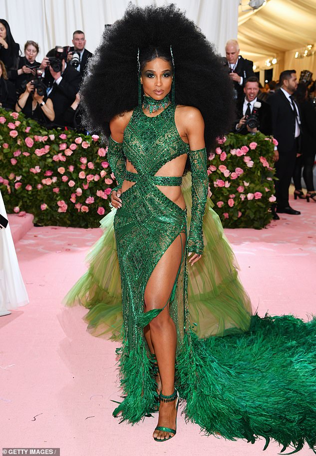 Ciara steps out at the Met Gala in emerald green cutout gown complete