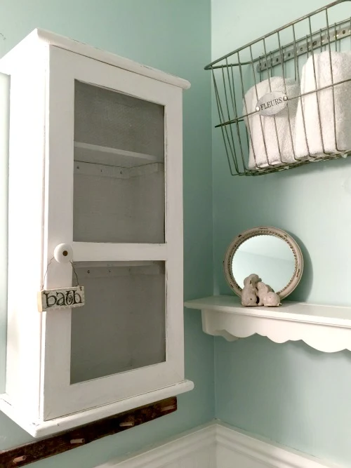 How to Repurpose a Clock into a Farmhouse Bathroom Cabinet www.homeroad.net