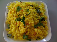 Aval Upma with puffed rice, onion and chilies