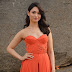 Indian Model Tamanna Latest Stills In Orange Top