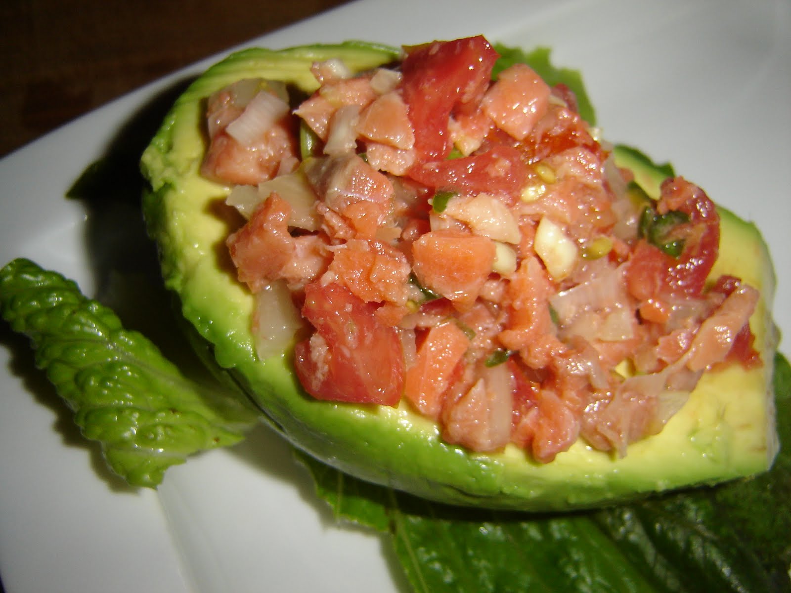 Honey From Rock Lomi Lomi Salmon Stuffed Avocado and Laulaus