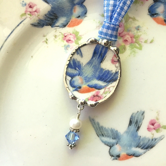 broken china jewelry bird