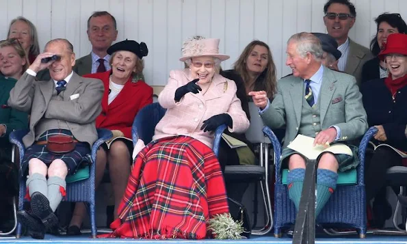 Queen Elizabeth ,Prince Philip and Prince Charles attend the annual Braemer Highland Games