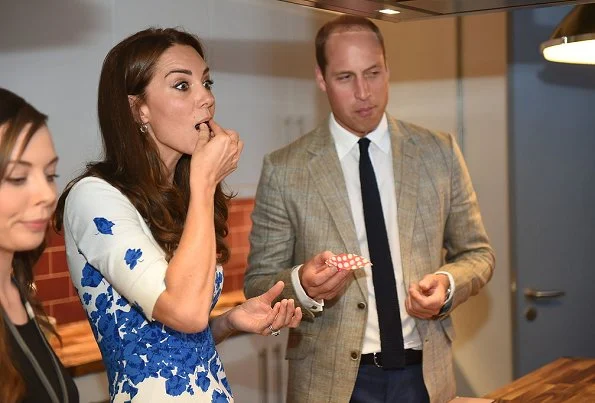 Kete Middleton and Prince William visit Luton. Kete Middleton wore LK. Bennett Lasa dress, and Clutch and Pumps - shoes