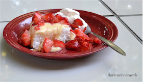 strawberries, custard, whipped cream and angel food cake