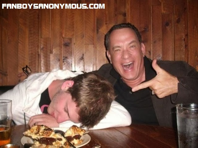Forrest Gump actor and comedian Tom Hanks takes photos with sleeping drunk student 