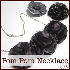 pom pom necklace and hair clips