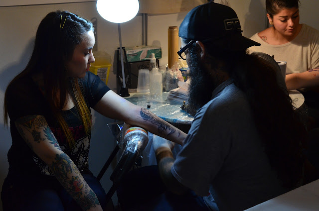 How does the process of tattooing