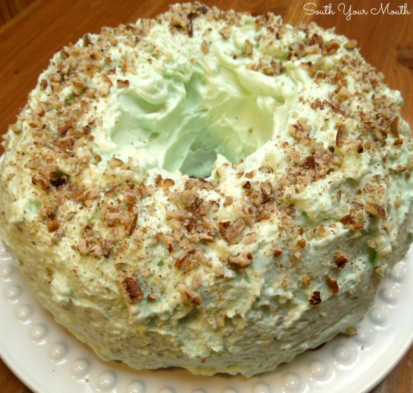 Pistachio Cake | Also called Watergate Cake, this moist cake recipe uses pistachio pudding in the cake and in the frosting. This is a perfect dessert for Easter, St. Patrick's Day and Christmas!