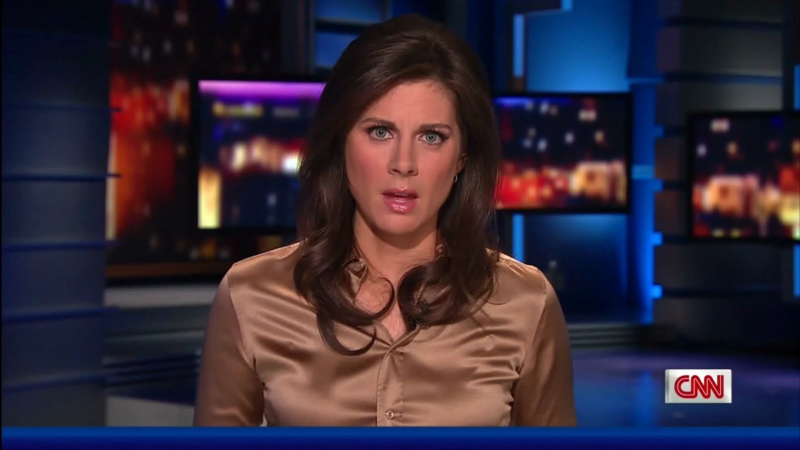 Ladies in Satin Blouses: erin burnett - light brown satin blouse.