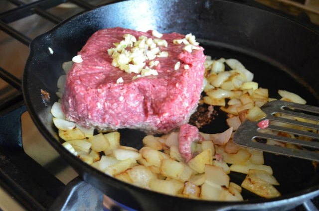 Saute onions, garlic, and hamburger to make Sloppy Joes from Serena Bakes Simply From Scratch.