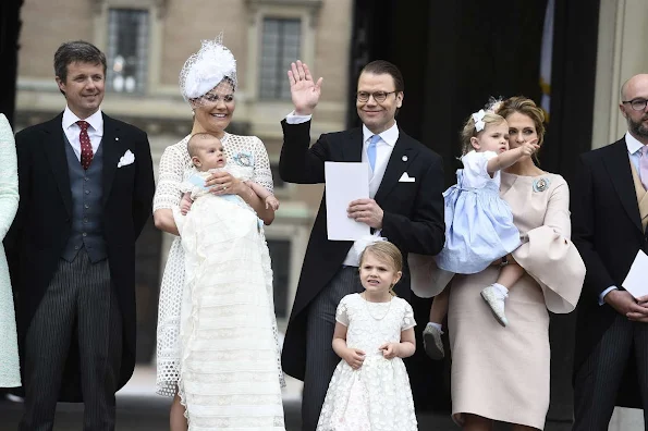 Queen Silvia and King Carl Gustaf of Sweden, Crown Princess Victoria, Prince Daniel, Princess Estelle, Princess Madeleine of Sweden with daughter Princess Leonore and Christopher O'Neill, Prince Carl Philip and Princess Sofia, Prince Haakon and Princess Mette-Marit of Norway, Crown princess Mary and Prince Frederik of Denmark, Ewa and Olle Westling at the christening of Prince Oscar of Sweden at the Royal Chapel in Stockholm.Antonio Berardi Blue Cape-back Stretch Crepe Dress