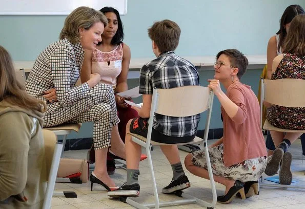 Queen Mathilde of Belgium visited the Maria Boodschap Lyceum, a catholic school for secondary education in Brussels for program Conflixers