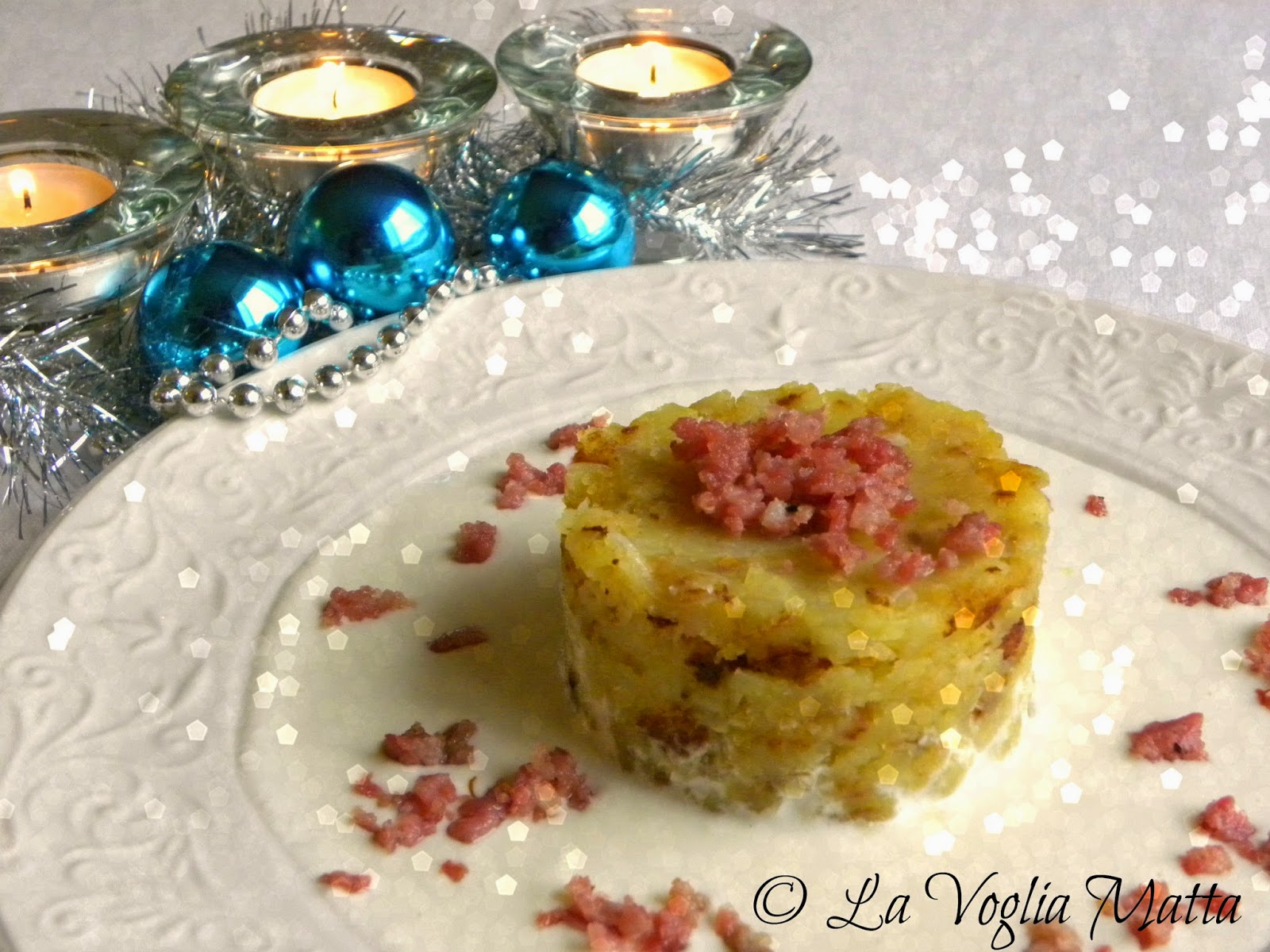 tortino di patate in tecia alla triestina su fonduta di bonquartì mauri e briciole di salsiccia