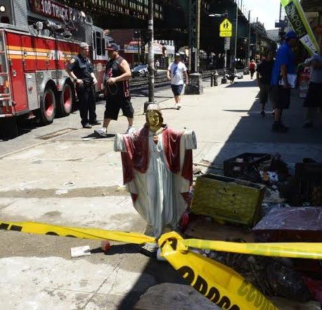 Photos: 'Jesus' Statue Doesn't Get Burn As Firefighters Retrieve Debris From Burning New York Religious Shop