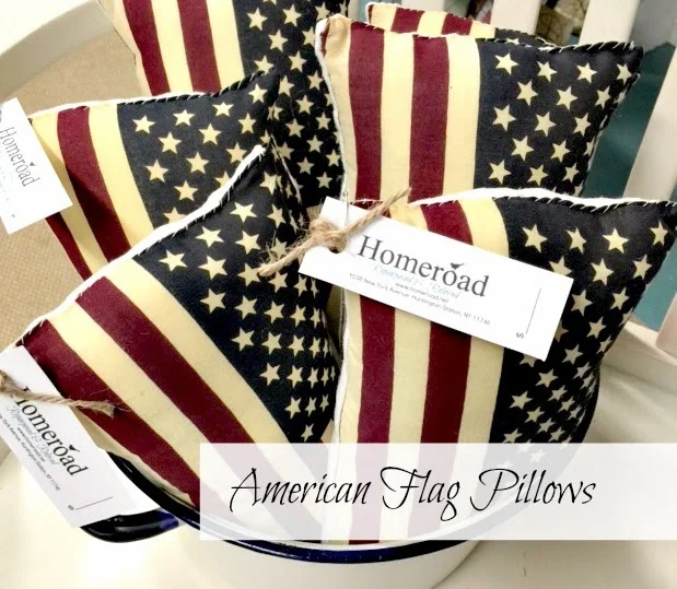 Flag pillows with tags in a bucket with overlay