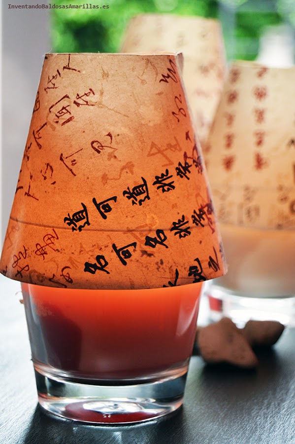 Decorar velas con papel