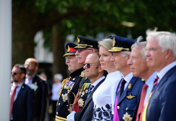 King Philippe and Queen Mathilde met with Queen Elizabeth II at Windsor Castle.Belgian Remembrance Parade. Queen wore Natan dress