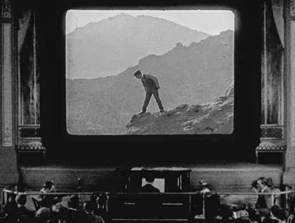 Buster Keaton's projectionist enters the screen in Sherlock Jr.