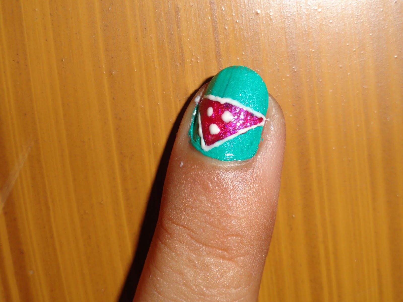multi colored stud triangles nail art