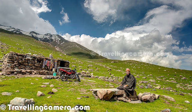 Peer Ki Gali is an amazing place on old Mughal road in Jammu & Kashmir State of India. This place is the highest passes on Srinagar Rajouri historic Mughal Road at 11300 Feets... Let's check out this Photo Journey to know more about this place with appropriate photographs...Various water streams can seen flowing through snow covered peaks of Peer-Ki-Gali hills. Cool freeze, freshening environment and roaming clouds all over makes this place wonderful. After talking to various folks at Peer ki Gali, we got to know that almost every day it rains on these hills. We spent two days around it and we also experienced rain showers both the days...Here is a photograph of a shopkeeper inside his small shop made up of stones. He had almost everything that is usually required for routine life in hills. These families come to these high hills with their cattle, as this place has got more than enough grazing land which becomes a problem during a particular time of the year. Ziarat of Peer Baba on hill top has gained its popularity. Almost every vehicle passing by Peer-ki-Gali stops here to enjoy the panaromic view as well as to take blessings of Peer Baba. Green layer on Peer-Ki-Gali hills looks amazing and it's a huge range of hills with green meadows...Shepherd sitting in these green hills around Peer ki Gali... Almost every alternate hill was full of sheeps and horses... This trend was only noticed around Peer-Ki-Gali on Mughal Road...In past this place have been of great interest for trekkers and now easily accessible for others as well. Tourism is picking up in this region of Jammu and Kashmir now. This will not only boost the economy of the state but also open new aspects to the residents.CRPF folks can seen here and there around these hills to make every person safe on these hills around Peer ki Gali. Really these folks are working really well to give confidence to common people to enjoy the beauty around Mughal Road.Sheeps all around in green hills of Peer Ki Gali, Kashmir, India.All these water streams make the whole environment more beautiful. All these streams have chilling water of melted snow of hill-tops. Dark clouds covering blue sky with lush green hills having multiple white-water streams - this whole combination makes Peer-Ki-Gali a unique place.Local folks on this stretch can organize various trekking trips with all arrangements for lodging in tents or some othe wooden houses, which can good source of income going forward.Jammu and Kashmir state of India is known as heaven on earth. In the seventeenth century the Mughal emperor Jahangir set his eyes on the valley of Kashmir and Peer-Ki-Gali is one of the place they used to stay. There is an old Mughal Residence in deep valley. Mughals said that if paradise is anywhere on the earth, it is here, while living in a houseboat on the mesmerizing Dal Lake.  In Jammu and Kashmir the most important tourist places are Kashmir, Srinagar, the Mughal Gardens, Gulmarg, Pahalgam, Jammu, and Ladakh...It will take a long more time to further develop the area but nobody can deny that it's magical. This whole stretch is magnetic. It draws you closer and closer. As we packed up, the beauty of the place wanted me to linger more. But I returned home with some amazing memories to cherish forever; vivid pics in the heart and mind that won't fade or get lost ever. It is a place that can't be expressed in words and that can't be explained in pics; just plan a trip and experience it all yourself.Before militancy intensified in 1989, tourism formed an important part of the Kashmiri economy. The tourism economy in the Kashmir valley was worst hit. Many five stars in Srinagar can be seen which are not well maintained now and owners can't afford to spend more on those properties. However, the holy shrines of Jammu and the Buddhist monasteries of Ladakh continue to remain popular pilgrimage and tourism destinations. Every year, thousands of Hindu pilgrims visit holy shrines of Vaishno Devi and Amarnath which has had significant impact on the state's economy.The Vaishno Devi yatra alone contributes Rs. 450+ crores to the local economy annually.Tourism in the Kashmir valley has rebounded in recent years and in 2009, the state became one of the top tourist destinations of India. Gulmarg, one of the most popular ski resort destinations in India, is also home to the world's highest green golf course. However with the decrease in violence in the state has boosted the states economy specifically tourism.Peer ki gali has religious importance as well. Most of the folks crossing through this place, stop by and spend some time around the mazar of Peer baba. This is of the holy places for Muslim saints. Here people from almost all the religions comes in large number to pray, on Thursday.There are some beautiful waterfalls around Peer Ki Gali and number/flow depends upon the time of the year & amount the snow these hills have got. Some of them are seasonal and many of them can be seen during most of the year.Kashmir's official language is Urdu. However the main languages spoken are Kashmiri in the Kashmir Valley, Ladakhi in Ladakh and Dogri in Jammu. Most people can speak Hindi as a second language. As elsewhere in India, English is fairly widely spoken among the educated classes and those involved in the tourist industry.Here i a photographs showing typical style of houses in Peer-Ki-Gali on Mughal Road in Jammu & Kashmir state of India. Mainly made up of rock-stones and flat roof made up of wood & mud. They are quite spacious and are seasonal. People go down to their main towns during snowfall in this region.A view of deep valley with curved roads from Peer-Ki-Gali, Jammu & Kashmir, India.