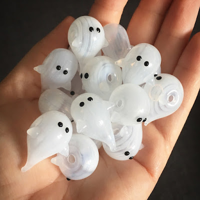 Lampwork blown glass hollow ghost beads by Laura Sparling