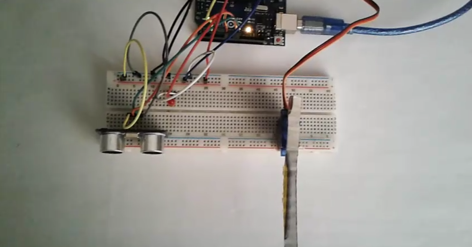 Slash bit: Automatic Railway Crossing barrier Using Arduino