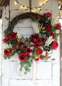 rustic elegance wreath with red roses, peonies, and heather